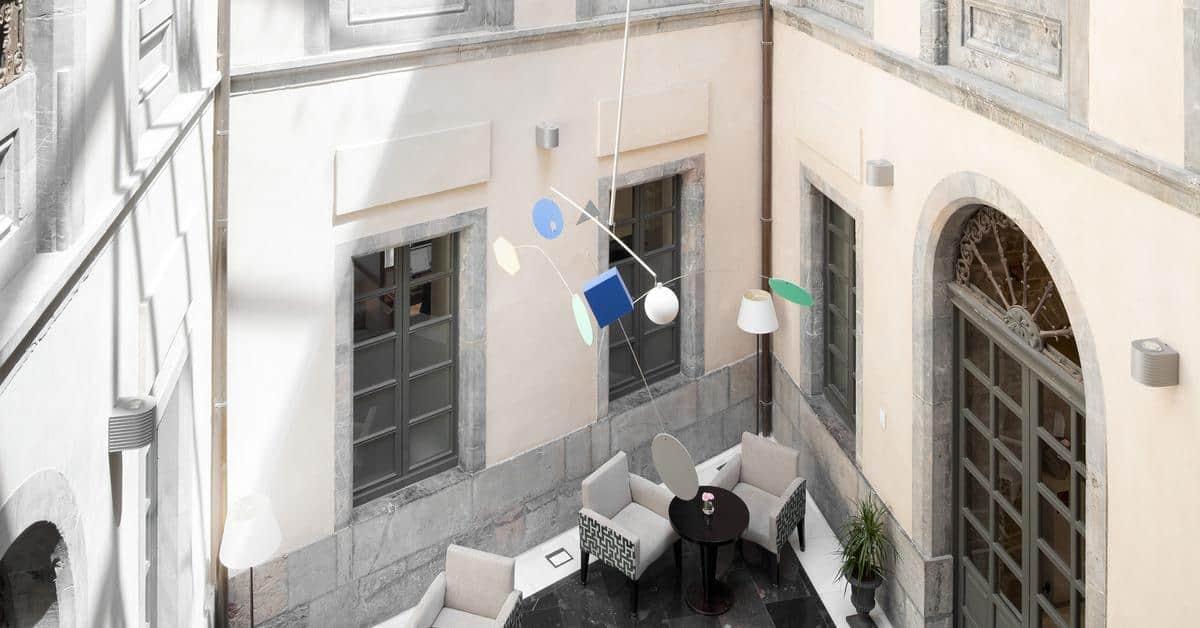 Palacio De Aviles Affiliated By Melia Eksteriør billede The mobile in the lobby of the National Gallery of Greece